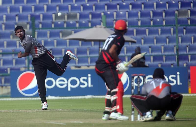 Spinner Shadeep Silva, left, will likely take the new ball for the UAE and 'actually seams the ball early on', says Aaqib Javed, the UAE coach. Sammy Dallal / The National