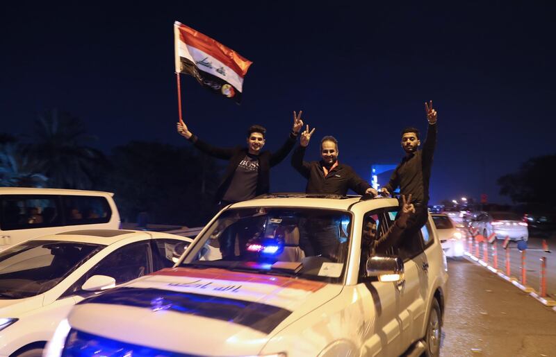 Iraqis celebrate the re-opening of the Green Zone. AFP
