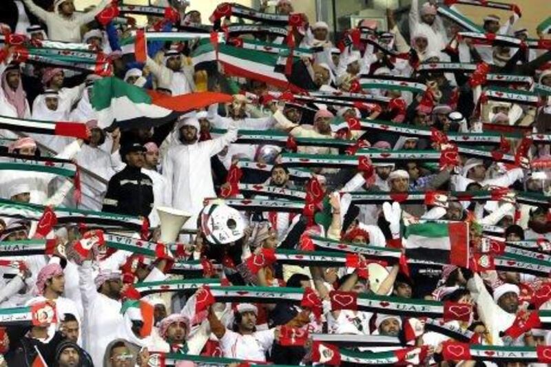 UAE fans cheers their side against Oman. Ali Al Saadi / AFP