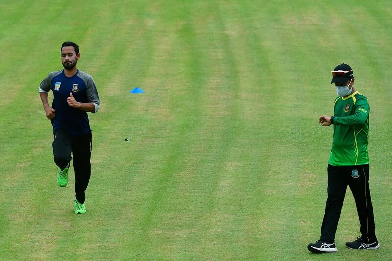 Bangladesh cricketer Mohammad Mithun , left, attends an individual training session at the Sher-e-Bangla National Cricket Stadium in Dhaka. AFP