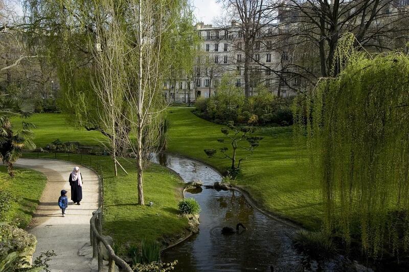 Square des Batignolles is an English-garden-style space with bridges, a pond and playgrounds. Amy Toensing / National Geographic Creative / Corbis