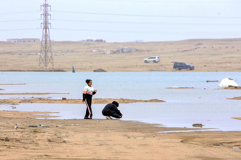 A flooded area caused by heavy rains, in Kuwait's al-Mutlaa desert, about 70 kilometres north of Kuwait City.  AFP