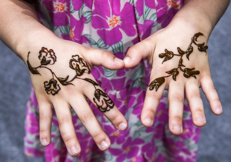 Henna decorations are popular at the festival, as are other culturally enriching activities