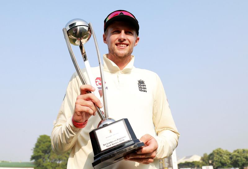 Cricket - England v Sri Lanka, Third Test - Colombo, Sri Lanka - November 26, 2018. England's captain Joe Root poses for photographs with the trophy after England won the match against Sri Lanka. REUTERS/Dinuka Liyanawatte