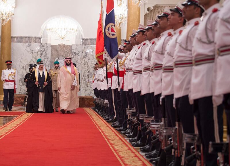 A handout photo made available by the Saudi Royal Court shows Saudi Crown Prince Mohammad Bin Salman (C) with the King of Bahrain Hamad bin Isa Al Khalifa (2-L), upon his arrival in Manama, Bahrain. EPA