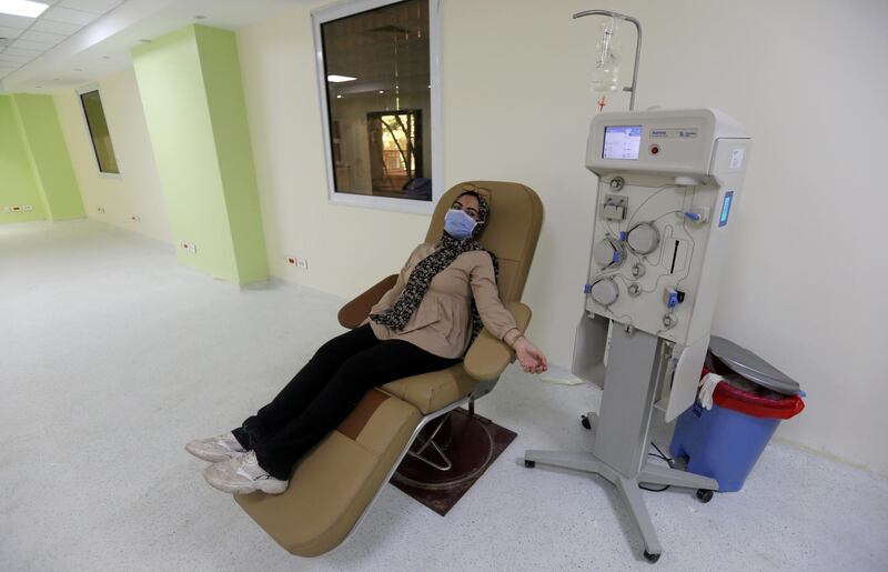 A patient who has recovered from the coronavirus disease donates her plasma for research purposes at the National Blood Transfusion Service in Cairo, Egypt. Reuters