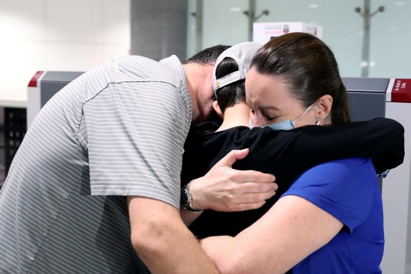 Luca Alexander Summers, 9, and his parents are united after he flew home from Sydney. Luca, whose family has lived in Dubai since 2000, was visiting with relatives in Australia when flights were suspended on March 19. All photos by Wam