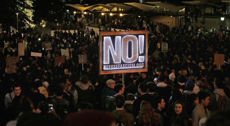 Demonstrators protest against Milo Yiannopoulos's scheduled speaking appearance on the University of California, Berkeley campus on February 1, 2017. Ben Margot / AP Photo