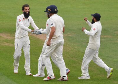 LONDON, ENGLAND - SEPTEMBER 11:  Moeen Ali of England celebrates with team mates after dismissing Ajinkya Rahane of India during the Specsavers 5th Test - Day Five between England and India at The Kia Oval on September 11, 2018 in London, England.  (Photo by Mike Hewitt/Getty Images)