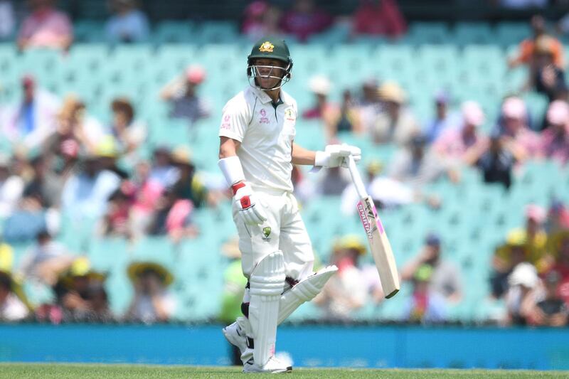 Australia opener David Warner of Australia leaves the field after being caught off the bowling of Neil Wagner. EPA