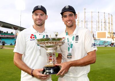 Cricket - England v India - Fifth Test - Kia Oval, London, Britain - September 11, 2018   England's Alastair Cook and James Anderson celebrate with a trophy after the match   Action Images via Reuters/Paul Childs