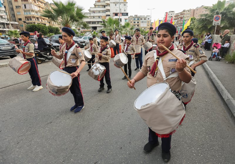 Members of the Muslim Scout Association play drums during events to mark the beginning of the holy fasting month, in Sidon, Lebanon. Reuters