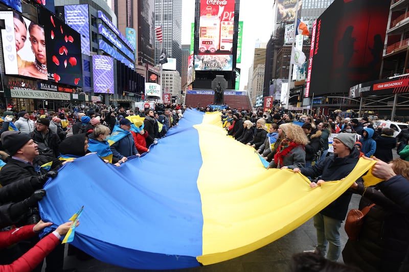 Protesters show support for Ukraine in Times Square, New York, on February 24. EPA