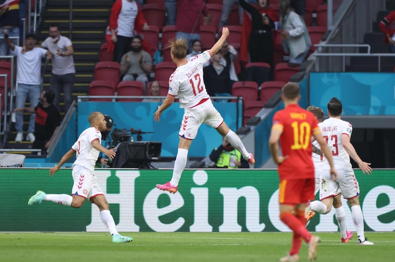 Denmark's forward Kasper Dolberg  celebrates scoring their second goal. AFP