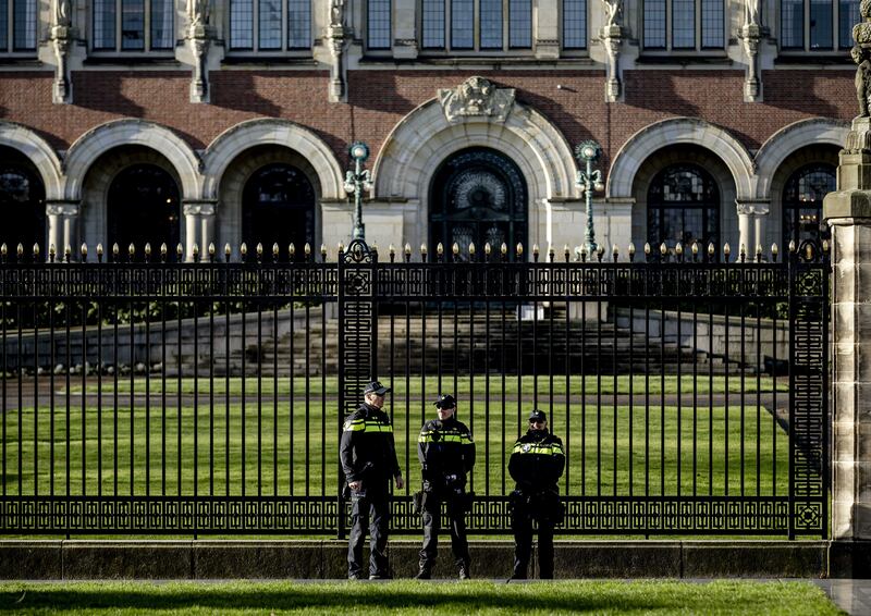 Police officers in front of the Peace Palace. EPA