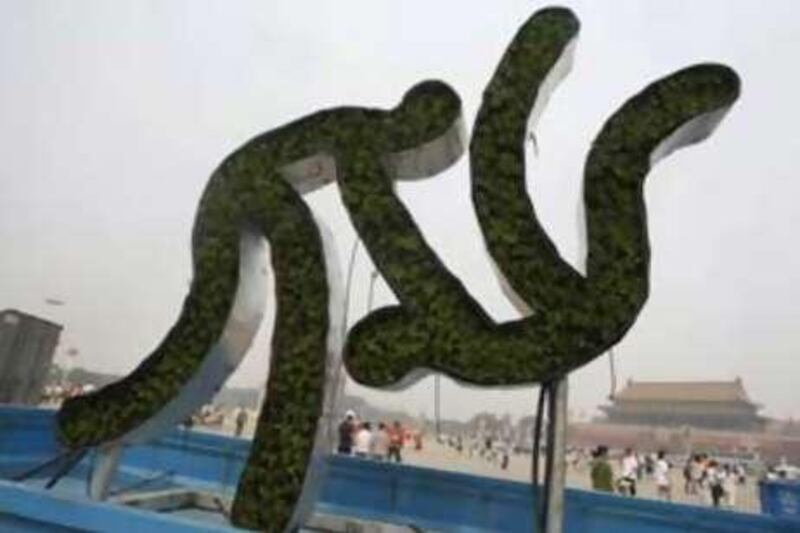 A pictogram sculpture of the Beijing 2008 Olympic Games is carried to Beijing's Tiananmen Square for an Olympic exhibit.