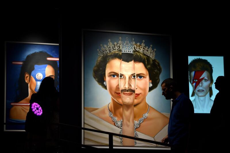 Visitors walk past an artwork at an exhibition 'MonuMental' by an anonymous artist who goes by the name Saint Hoax at the Dome City Centre known as 'The Egg' in downtown Beirut, Lebanon.  EPA