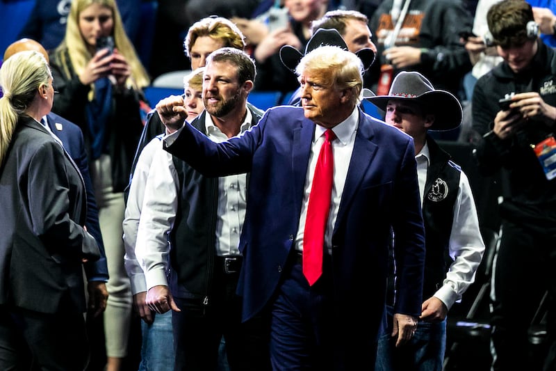 Former President Donald Trump greets fans on Saturday in Oklahoma. AP