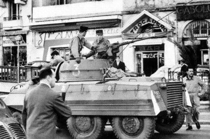 Tanks and troops patrol the streets of Algiers non-stop in the lead-up to the cease-fire.