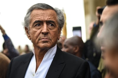 A file photo of French philosopher Bernard-Henri Levy takes part in a demonstration at the Human Rights plaza in Paris on October 12, 2019. AFP