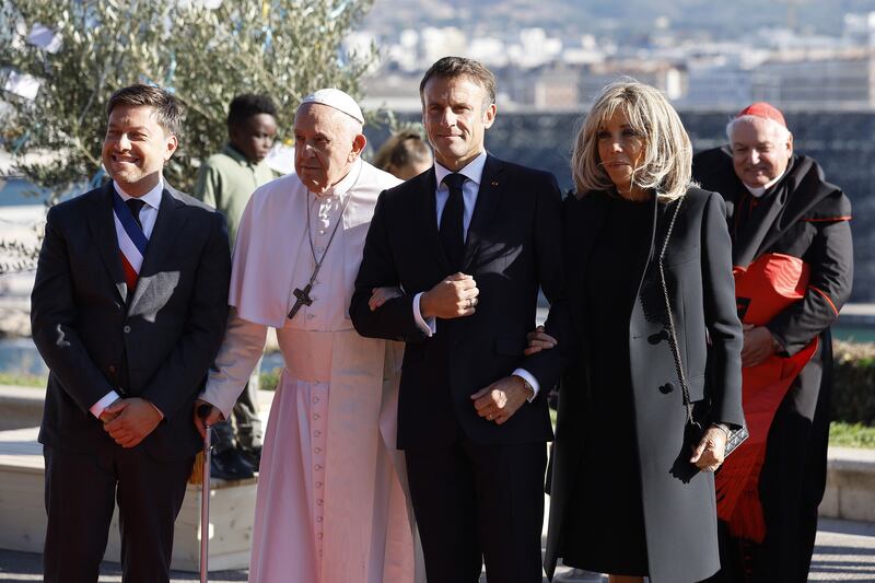 The mayor of Marseille, Benoit Payan, left, with Pope Francis,  President Macron and his wife Brigitte in the southern French city. EPA