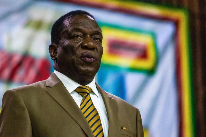(FILES) In this file photo taken on December 14, 2017 Zimbabwe's President Emmerson Mnangagwa delivers a speech during the opening of the 107th annual conference of the Zanu-PF Central Committee at the party headquarters in Harare.
Zimbabwean President Emmerson Mnangagwa said on March 16, 2018 that the country "has moved on" in response to claims by former president Robert Mugabe that he was ousted in an illegal "coup d'etat". Mnangwa added in a short statement that he "noted recent remarks made to the media" by Mugabe who spoke to foreign journalists at a location in Harare on Thursday. It was Mugabe's first public statement since his resignation in November.
 / AFP PHOTO / Jekesai NJIKIZANA
