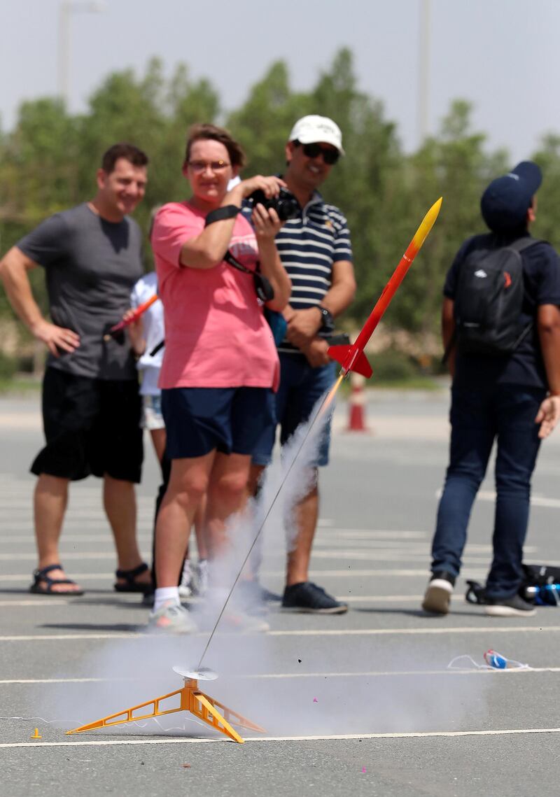 DUBAI,  UNITED ARAB EMIRATES , May 4 – 2019 :- Parents and students watching the Model Rocket Launch organised by SARAUAE (Space and Rocketry Academy UAE) by Compass International at Dubai Parks and Resorts in Dubai. More than 150 students from several schools across the UAE participated in the rocket launch that they have built during the SARAUAE camps over last few months. ( Pawan Singh / The National ) For News. Story by Anna