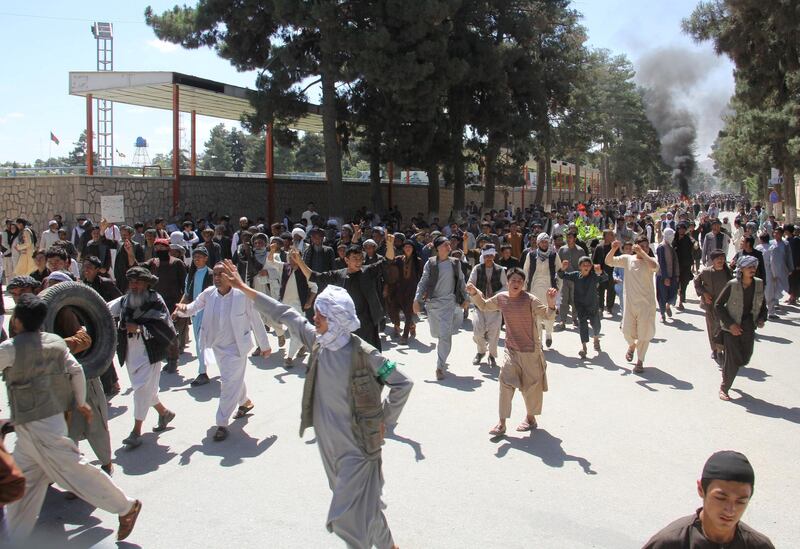 REFILE - ADDING INFORMATION Afghan protesters shout slogans during a protest in Maimana, capital of Faryab province, Afghanistan July 4, 2018. REUTERS/Stringer NO RESALES. NO ARCHIVES