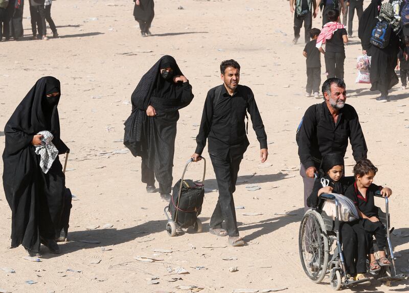 Walking allows pilgrims to feel the suffering of Imam Hussein's family, who walked from Damascus to Karbala, says Abbas Kadhim, director of the Atlantic Council's Iraq Initiative. Reuters