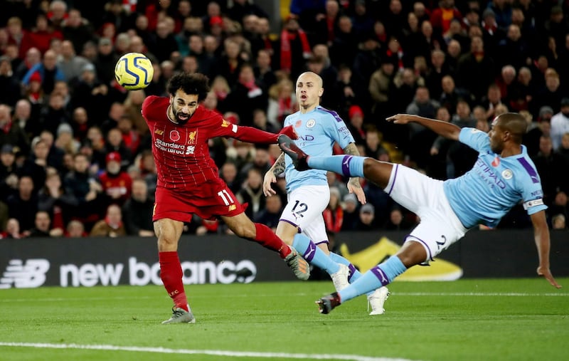 Liverpool's Mohamed Salah scores their second goal against Manchester City. Reuters