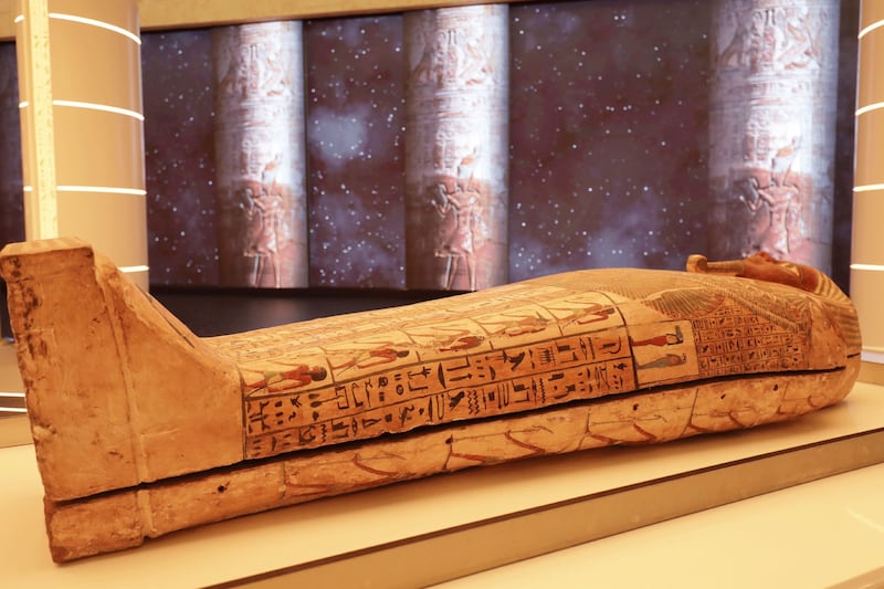 The coffin's central part is decorated with religious incantations.