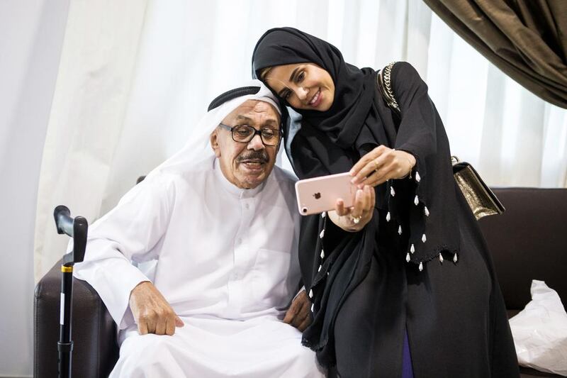 Hamza Al Hashim with daughter Yasmeen. His return home is a tribute to his rehabilitation work. Reem Mohammed / The National