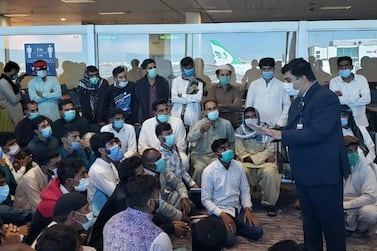 Pakistan's consul-general, Ahmed Amjad Ali, speaks with Pakistani citizens who were denied entry into Dubai. Courtesy: Consulate General of Pakistan in Dubai 
