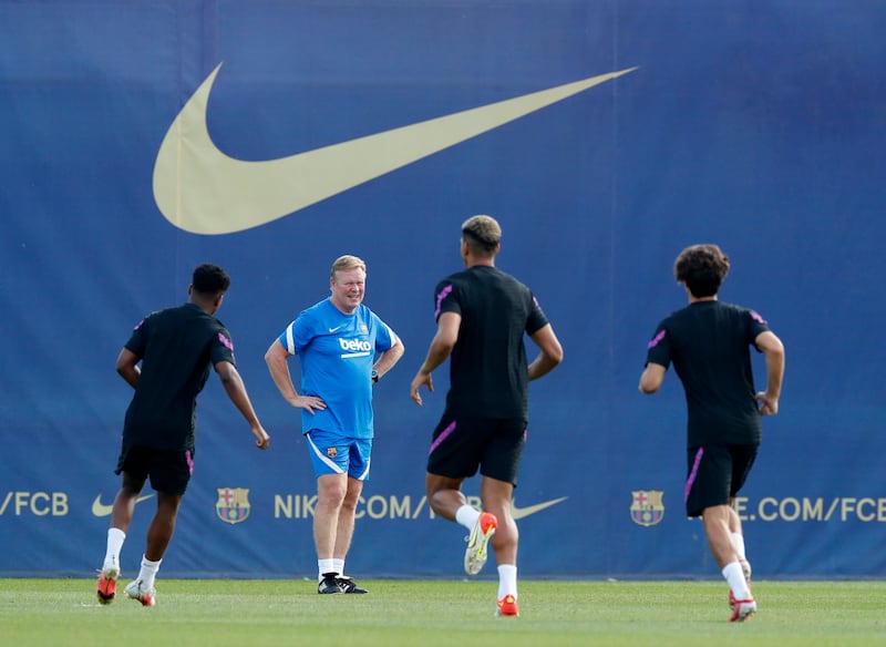 Barcelona manager Ronald Koeman oversees training. Reuters