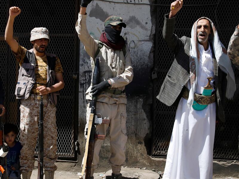 Houthi supporters and fighters in Sanaa. The Yemeni rebels claim an activist who was found dead on Sunday had escaped from their custody. EPA