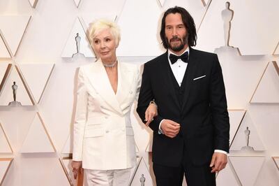 US actor Keanu Reeves (R) and his mother Patricia Taylor arrive for the 92nd Oscars at the Dolby Theatre in Hollywood, California on February 9, 2020.  / AFP / Robyn Beck
