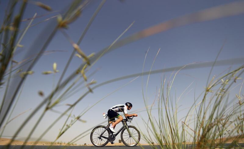 Triathlete Brett Hallam trains at the Al Qudra Cycling Track on May 14, 2020 in Abu Dhabi, United Arab Emirates. Getty Images