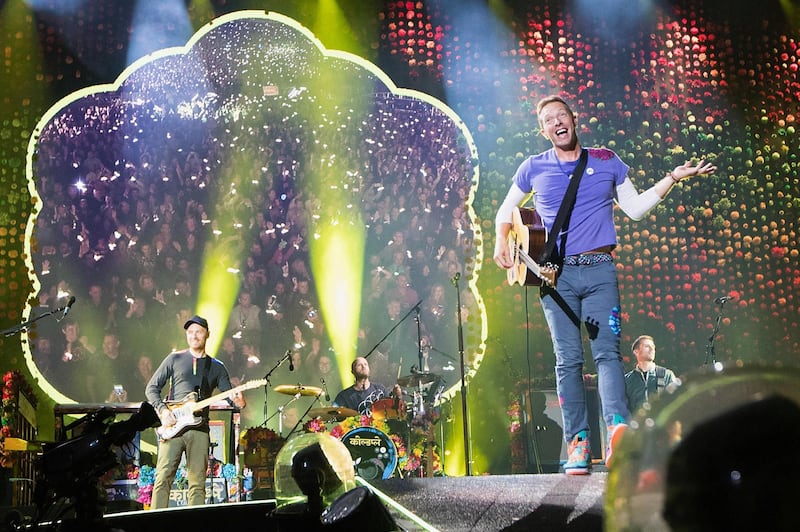 SEATTLE, WA - SEPTEMBER 23:  Jonny Buckland, Will Champion, Chris Martin and  Guy Berryman of Coldplay perform on stage at CenturyLink Field on September 23, 2017 in Seattle, Washington.  (Photo by Mat Hayward/Getty Images)