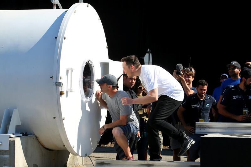Elon Musk, founder, CEO and lead designer at SpaceX and co-founder of Tesla, watches the Swiss Loop team's Hyperpod at the SpaceX Hyperloop Pod Competition II in Hawthorne, California. Mike Blake / Reuters