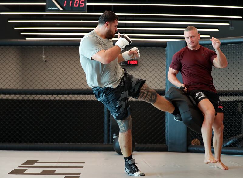 Tai Tuivasa kicks the pads during a training session in Dubai before his UFC heavyweight fight in Paris, France. 
