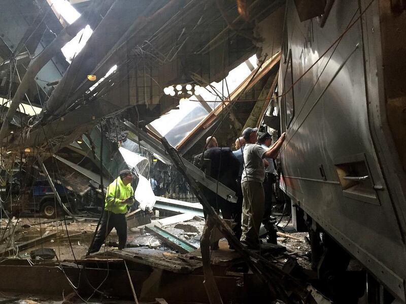 Train personnel survey the NJ Transit train that crashed in to the platform at the Hoboken Terminal on September 29, 2016 in Hoboken, New Jersey.   Pancho Bernasconi/Getty Images/AFP