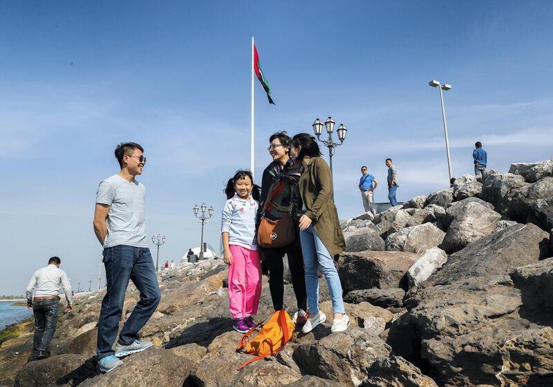 Abu Dhabi, U.A.E., February 10, 2018.  Chinese tourists enjoying the Abu Dhabi sights at the UAE Heritage Village.
Victor Besa / The National
National
Requested By:  Olive Obina