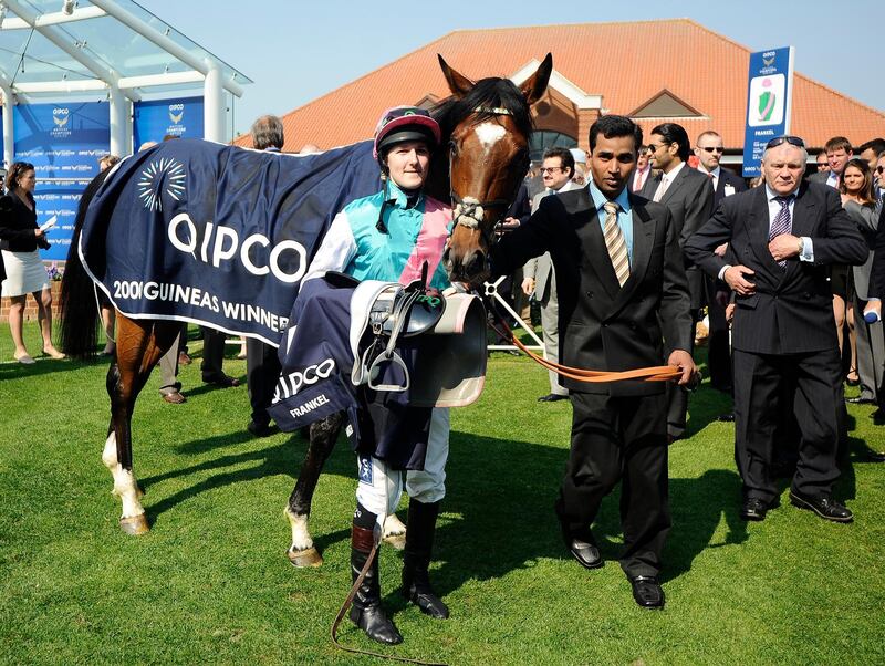 NEWMARKET, ENGLAND - APRIL 30:  Tom Queally with Frankel win at The Qipco 2000 Guineas Stakes as owner Khalid Abdulla holds the horse at Newmarket racecourse on April 30, 2011 in Newmarket, England. (Photo by Alan Crowhurst/ Getty Images)