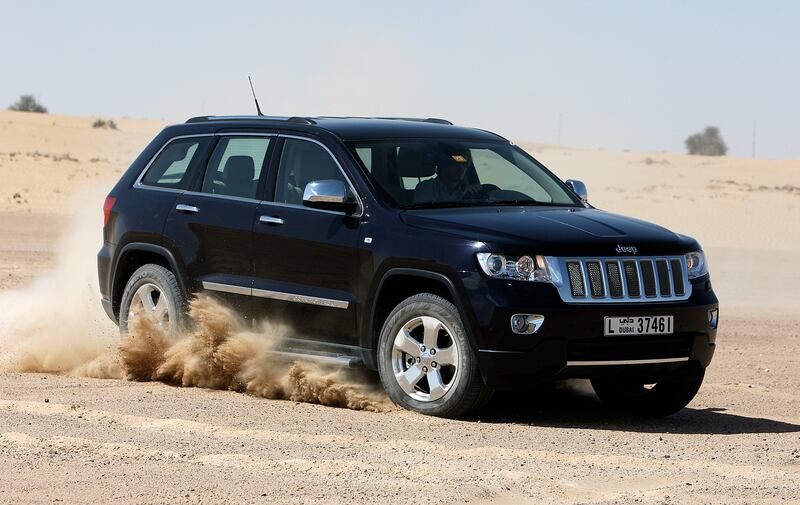 
DUBAI, UNITED ARAB EMIRATES Ð Mar 13,2011: Neil Vorano driving the Jeep Grand Cherokee during the test drive in Dubai. (Pawan Singh / The National) For Motoring. Story by Neil