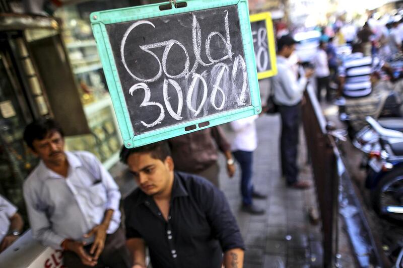 Gold prices are displayed on a sign outside a jewellery store in Mumbai, India. Dhiraj Singh / Bloomberg