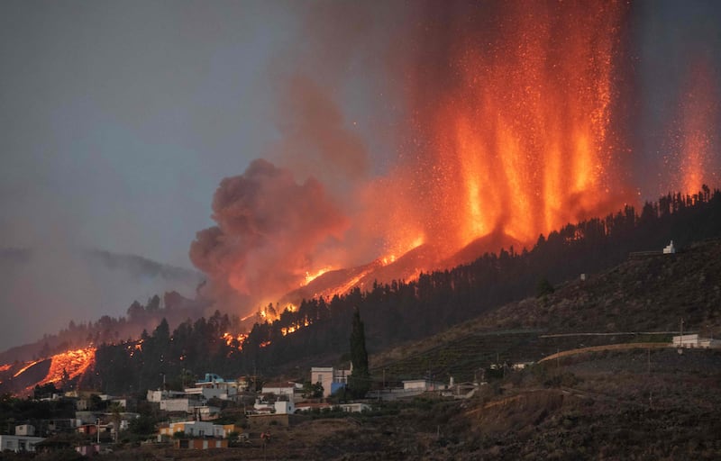 Mount Cumbre Vieja erupts in El Paso, spewing out columns of smoke, ash and lava on the Canary island of La Palma. The Cumbre Vieja volcano erupted on Spain's Canary Islands after days of increased seismic activity, sparking the removal of people living nearby, authorities said.  Cumbre Vieja straddles a ridge in the south of La Palma island and erupted twice in the 20th century, first in 1949 then again in 1971. AFP