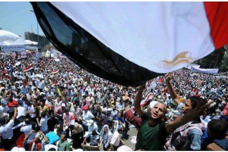 Dissatisfaction was the biggest common factor for the thousands who rallied in Cairo's Tahrir square yesterday. Elsewhere in Egypt several smaller rallies took place to help defend the uprising that toppled Hosni Mubarak and to show anger at the new military rulers' slow pace of reforms. Mohamed Hossam / AFP