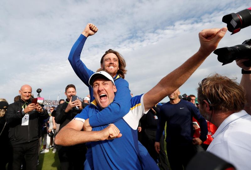 Ian Poulter and Tommy Fleetwood celebrate after winning the Ryder Cup. Reuters