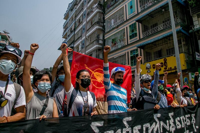 Protesters take part in a demonstration against the military coup in Yangon's Tamwe township. AFP