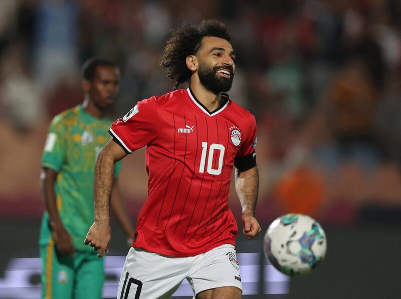 Mohamed Salah celebrates completing his hat-trick. Reuters